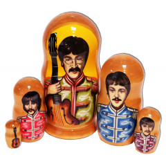 Nesting doll popular singers Beatles with guitar in military costumes
