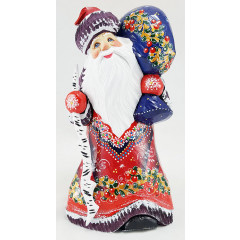 New Year and Christmas carved wooden toy Santa Claus with a birch stick