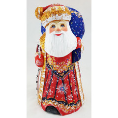 New Year and Christmas carved wooden toy Santa Claus with big blue bag and birch stick