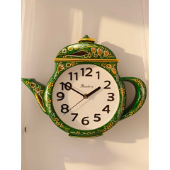 Khokhloma gift Kitchen clock, kettle, style - Lily of the Valley on a green background.
